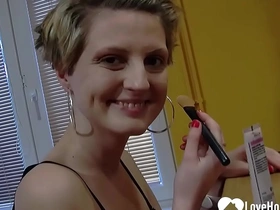 Desirable chick teases while putting on makeup