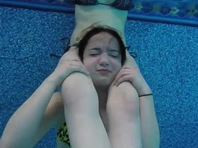 Underwater girl vs girl head scissors