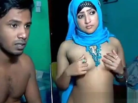 A seductive Arab knockout with a subsistence figure teases passionately on webcam, lost in forbidden fantasies.